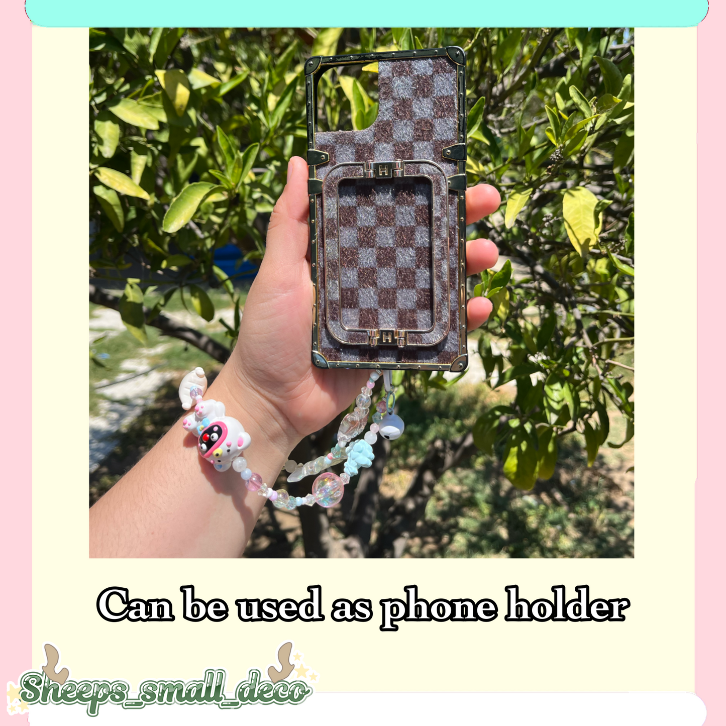 White keychain/phone holder